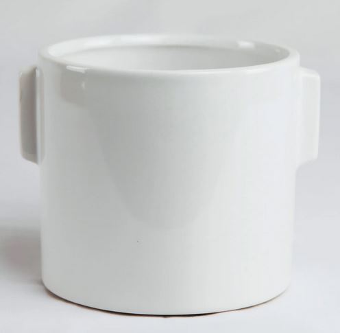 White ceramic pot on a light gray background