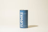 Blue cylindrical container with 'FLOWRS' branding on a beige background
