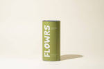 Green canister with 'FLOWRS' branding on a beige background