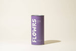 Purple cylindrical container with 'FLOWRS' branding on a beige background