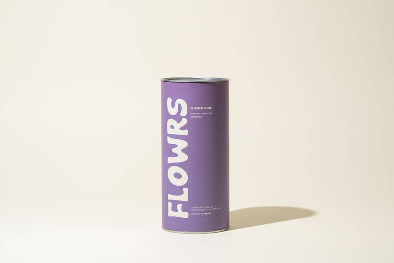 Purple cylindrical container with 'FLOWRS' branding on a beige background