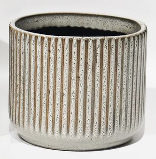 Textured ceramic pot on a white background