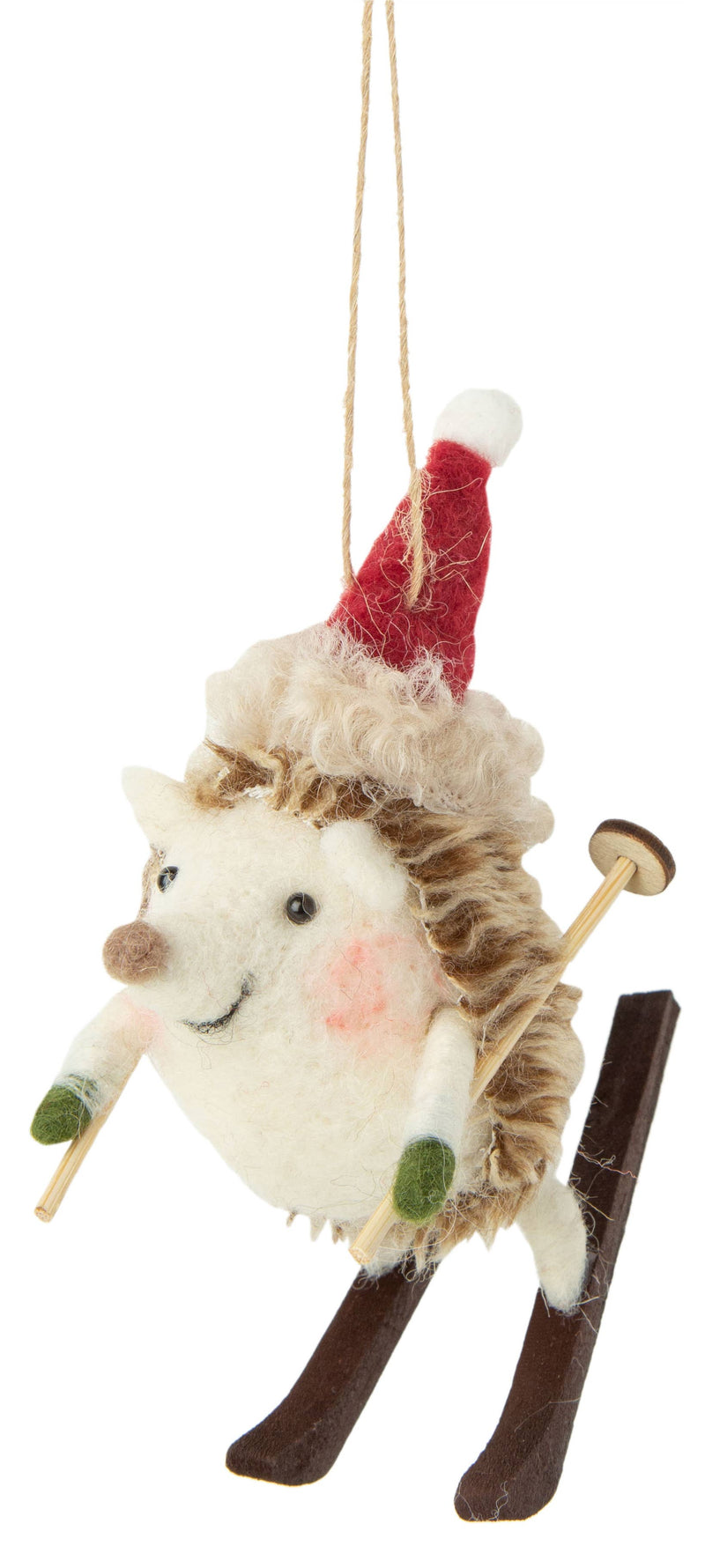 Decorative ornament of a hedgehog on skis with a Santa hat, hanging on a white background.